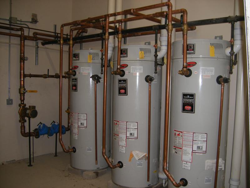 Three water heaters in a commercial setting